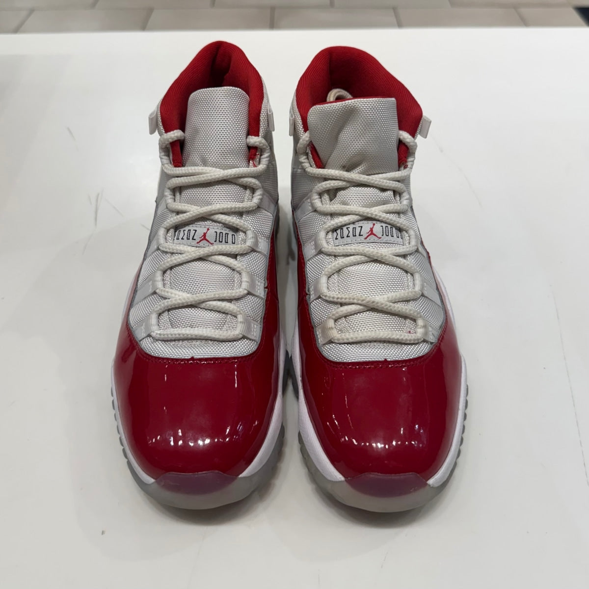 Jordan 11 Retro Cherry (2022) Size 10.5 (Lightly Worn Pre-Owned) - Image 3