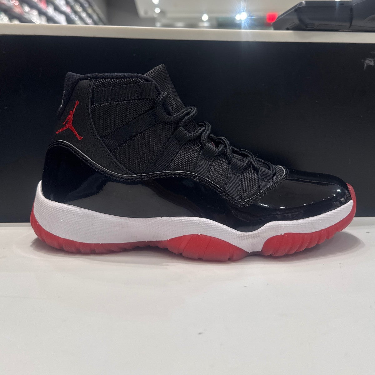Jordan 11 Retro Playoffs Bred (2019) Size 8 (VNDS Pre-Owned) - Image 1