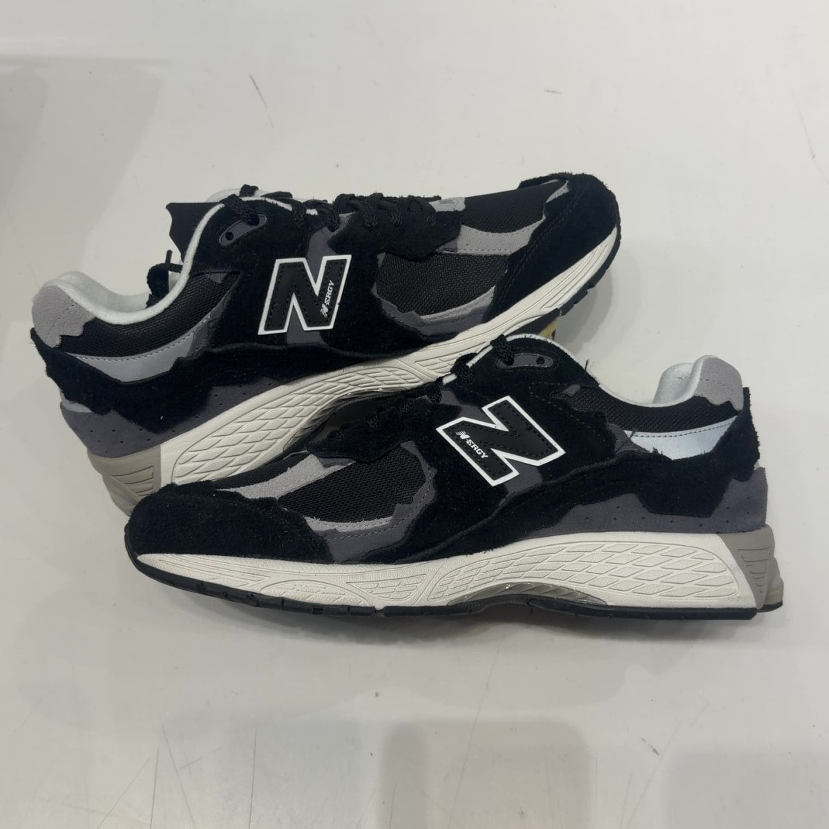 New Balance 2002R Protection Pack Black Grey Size 12 (VNDS Pre-Owned) - tag