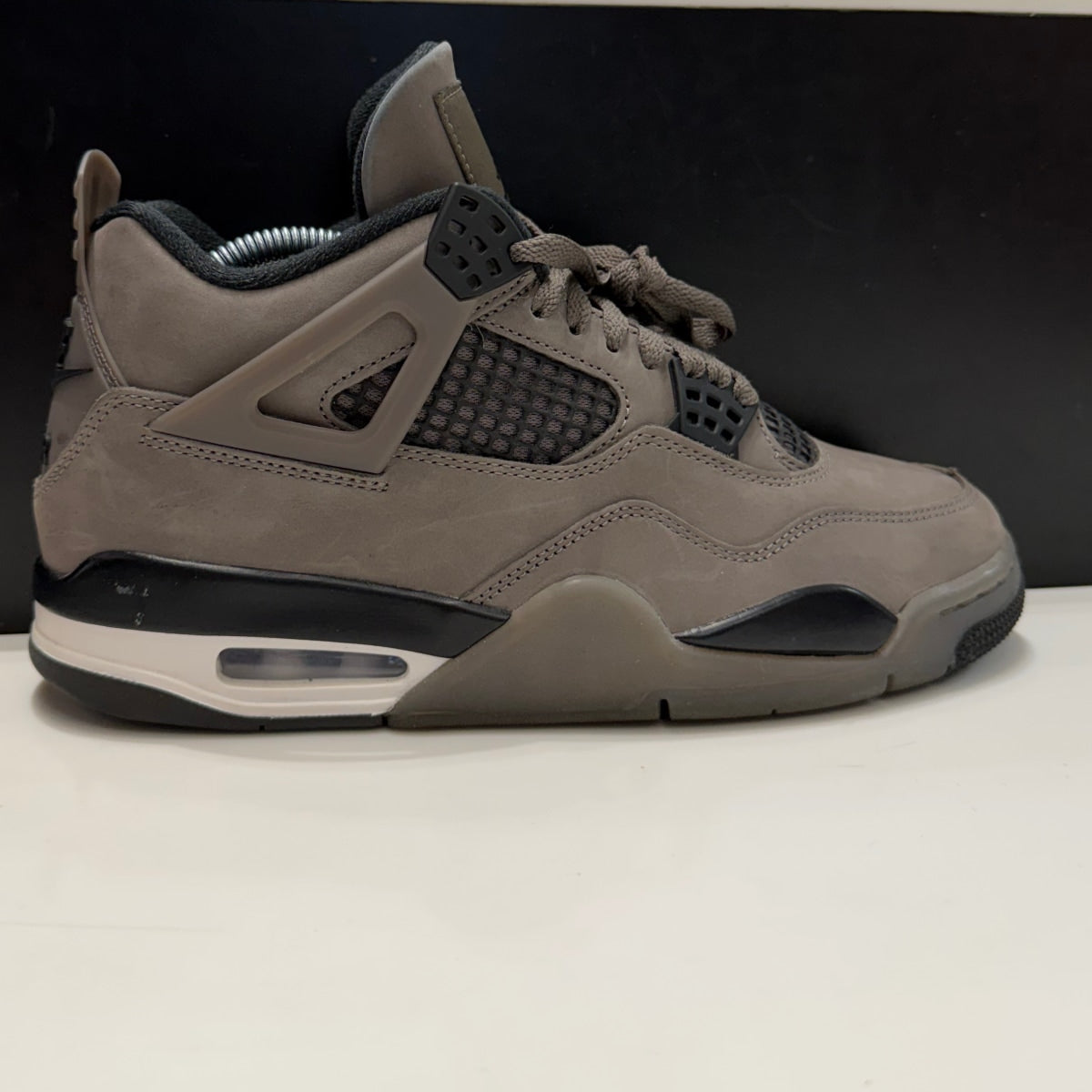 Jordan 4 Retro Cave Stone Size 8 (Lightly Worn Pre-Owned) - Image 1
